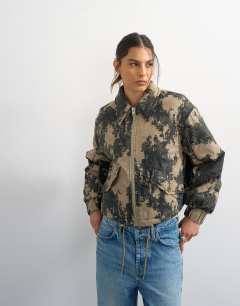 Model wearing Printed cotton jacket in green