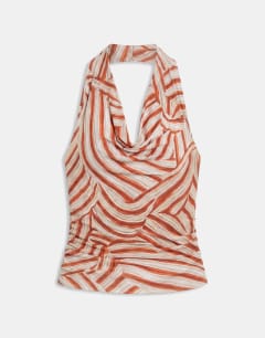 Model wearing Printed cowl neck halter top in multi