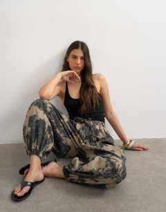 Model wearing Printed oversized balloon cargo trouser in neutral