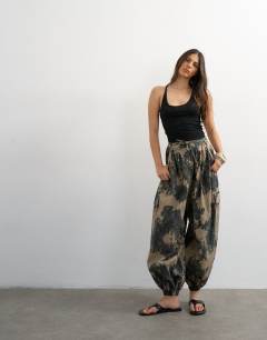 Model wearing Printed oversized balloon cargo trouser in neutral