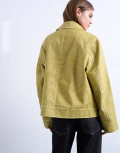 Model wearing PU zip through jacket in chartreuse