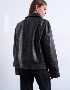 Model wearing PU zip through jacket in washed black