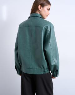Model wearing Pu zip through seam detail jacket in teal