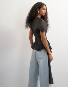 Model wearing Puff sleeve organza ruffle detail top in black