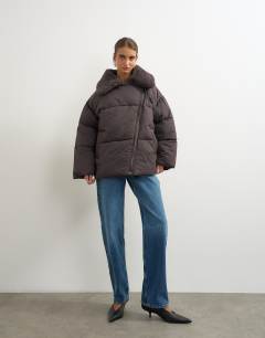 Model wearing Puffer with detachable borg collar in chocolate