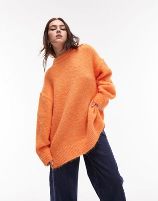 Topshop - Pull long en maille duveteuse à col ras de cou et coutures apparentes - Orange | ASOS