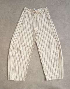 Model wearing Pull on barrel jean in ecru stripe