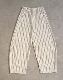 Model wearing Pull on barrel jean in ecru stripe