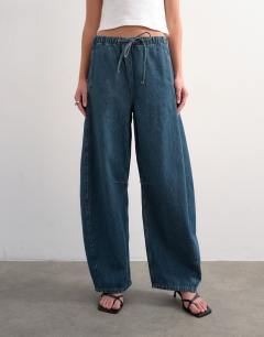 Model wearing Pull on barrel jean in sulphur blue