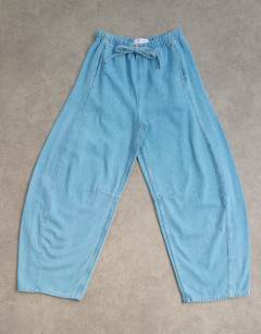 Model wearing Pull on barrel jean in summer blue 