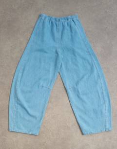 Model wearing Pull on barrel jean in summer blue 