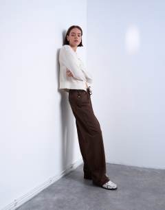 Model wearing Pull on jogger jean in chocolate brown