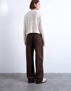Model wearing Pull on jogger jean in chocolate brown