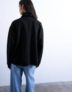 Model wearing Quarter zip sweat in black