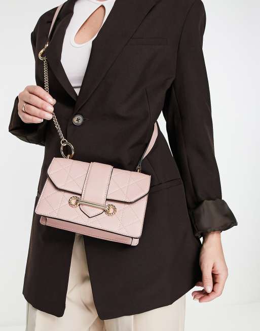 quilt trophy crossbody bag in light pink ASOS