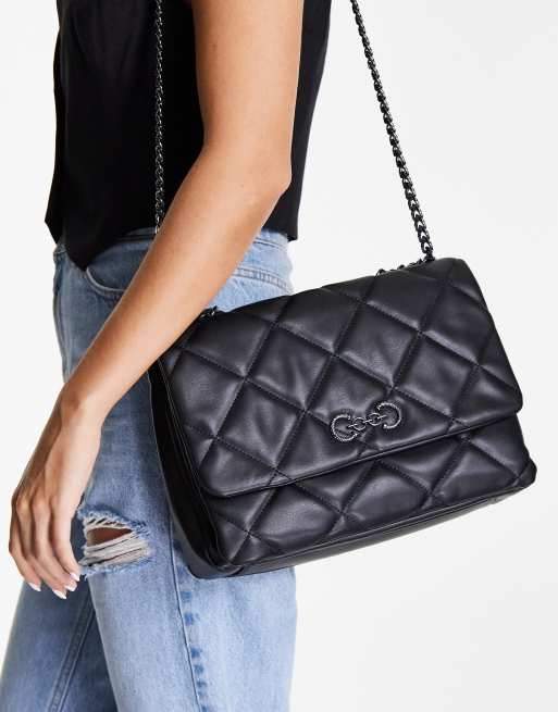 quilted shoulder bag with trophy piece in black ASOS