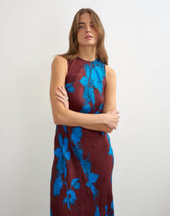 Model wearing Racer neck maxi dress in dark based floral jacquard