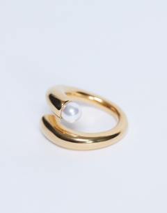Model wearing Rachel stainless steel pearl detail ring in gold