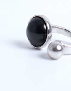 Model wearing Rae stainless steel ring with semi precious stone in silver & black