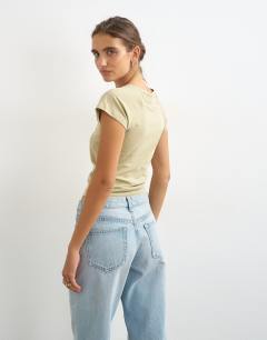 Model wearing Raglan clean t shirt in khaki
