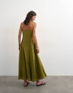 Model wearing Raw seamed strappy maxi dress in chartreuse green