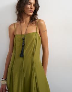 Model wearing Raw seamed strappy maxi dress in chartreuse green