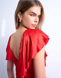 Model wearing Raw seemed frill mini dress in red