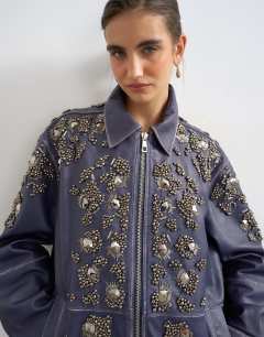 Model wearing Real leather beaded jacket in blue
