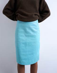 Model wearing Real leather midi skirt in turquoise