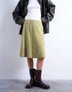 Model wearing Real suede panelled midi skirt in avocado