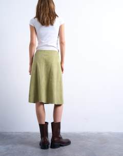 Model wearing Real suede panelled midi skirt in avocado