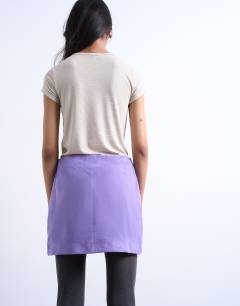 Model wearing Real suede pelmet mini skirt in purple