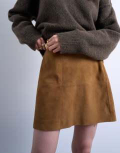 Model wearing Real suede seamed mini skirt in toffee