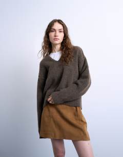 Model wearing Real suede seamed mini skirt in toffee