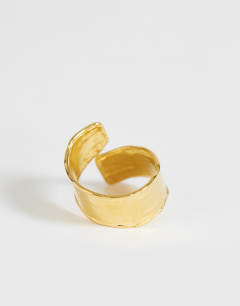 Model wearing Rebecca waterproof hammered ring in gold