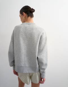 Model wearing Relaxed Studio 6 graphic sweatshirt