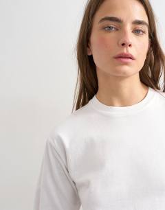 Model wearing Relaxed tee in white
