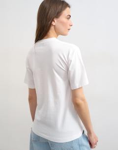 Model wearing Relaxed tee in white