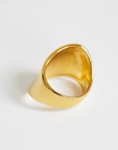Model wearing Remi waterproof asymmetric ring in stainless gold