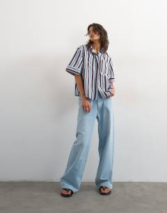 Model wearing Resort boxy shirt in blue stripe
