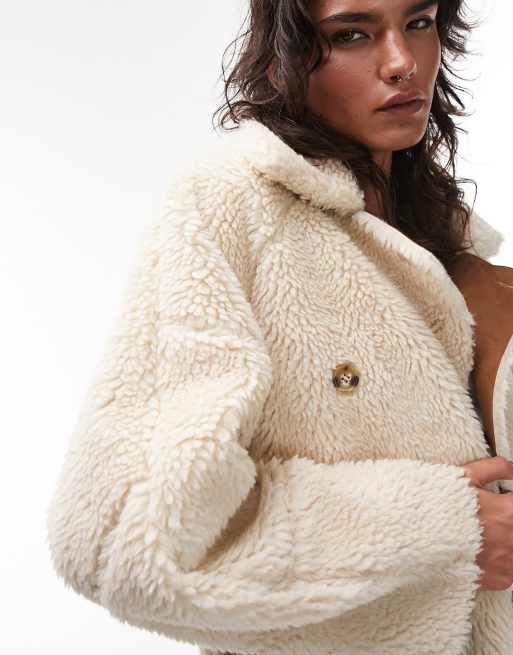 ASOS DESIGN curly faux sheepskin jacket in sand