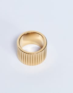 Model wearing Rhodes waterproof stainless steel ring in gold