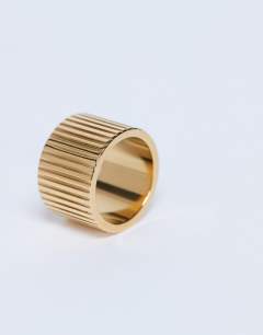 Model wearing Rhodes waterproof stainless steel ring in gold