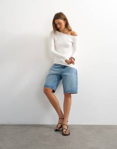 Model wearing Rib asymmetric off the shoulder long sleeve top in ecru