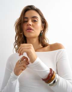 Model wearing Rib asymmetric off the shoulder long sleeve top in ecru