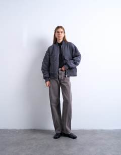 Model wearing Rib bomber jacket in slate