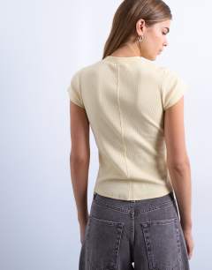 Model wearing Rib fitted curve hem tee in buttermilk