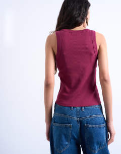 Model wearing Rib racer vest in burgundy