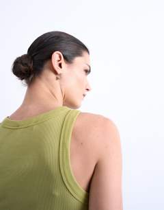 Model wearing Rib racer vest in olive green