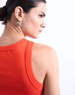 Model wearing Rib racer vest in orange